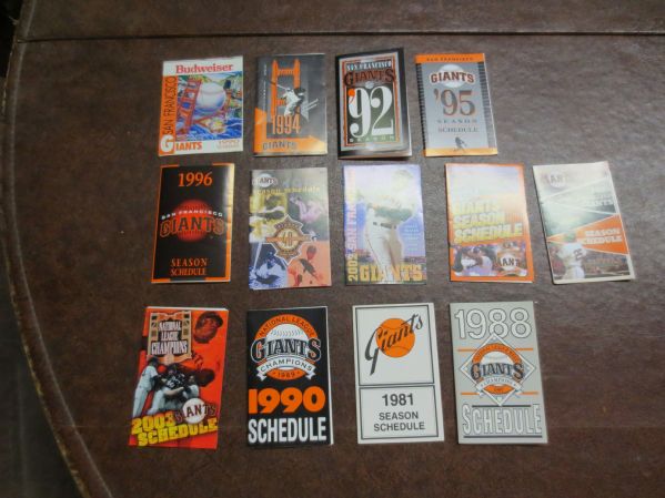 14 different San Francisco Giants vintage pocket schedules