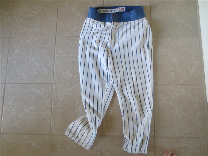 Assortment of Baseball Game Used:  White Sox Jersey, 1978 Mets Road Pants, 1989 Cubs Home pants 