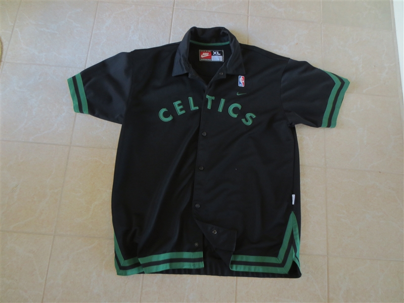 BASKETBALL Assortment of: Game Used Northwestern Wildcats Long Warm up pants, Celtics replica jersey, Globetrotters program