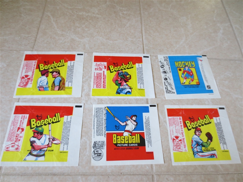(4) different 1973 Topps Baseball Wax Wrappers + 1979-80 Topps Hockey Wax wrapper