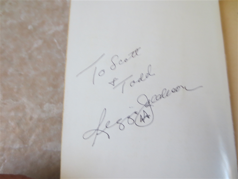 Reggie Jackson autograph in a John Grisham novel   Unique!