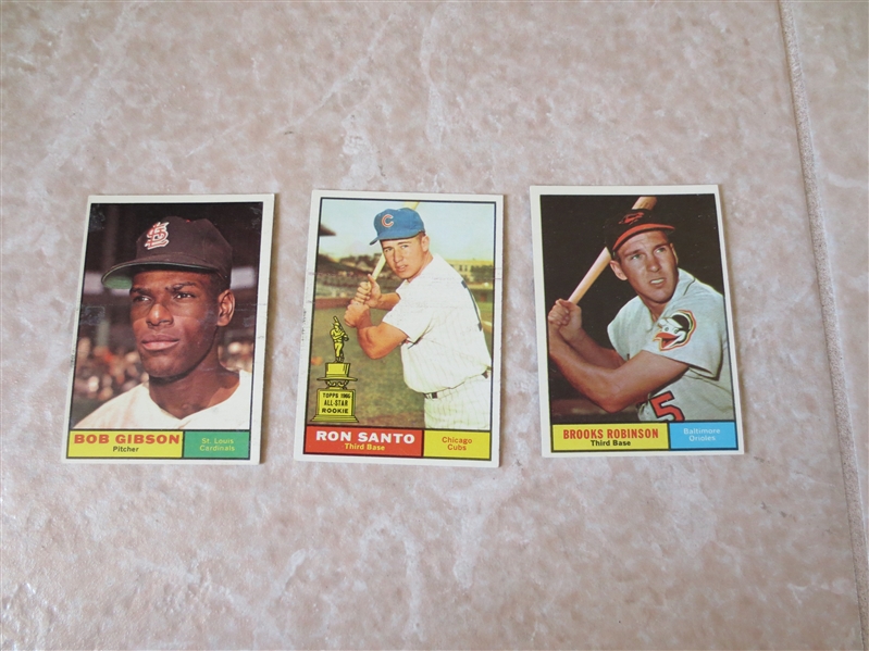 1961 Topps Bob Gibson, Ron Santo rookie, and Brooks Robinson baseball cards