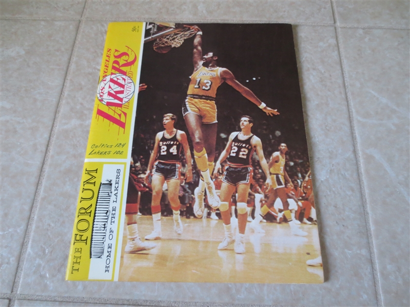 1969 Boston Celtics at Los Angeles Lakers basketball program Wilt dunks cover/Bill Russell last year