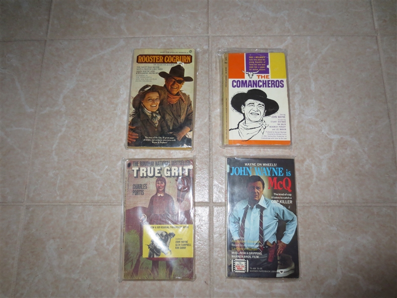(4) vintage John Wayne movie paperback books: True Grit, McQ, Rooster Cogburn, The Comancheros