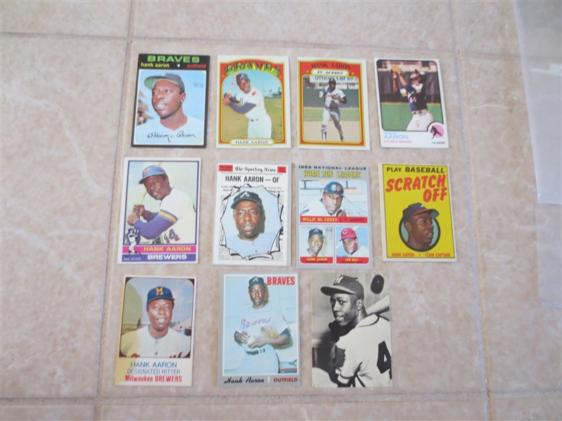 (11) 1970's baseball cards picturing Hank Aaron mostly Topps