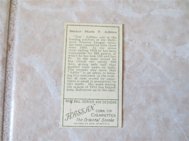 1911 T205 Doc Adkins Baltimore Hassan back Factory 649 minor league baseball card