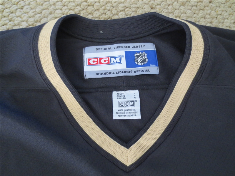 Anaheim Ducks hockey jersey by CCM large Never used.