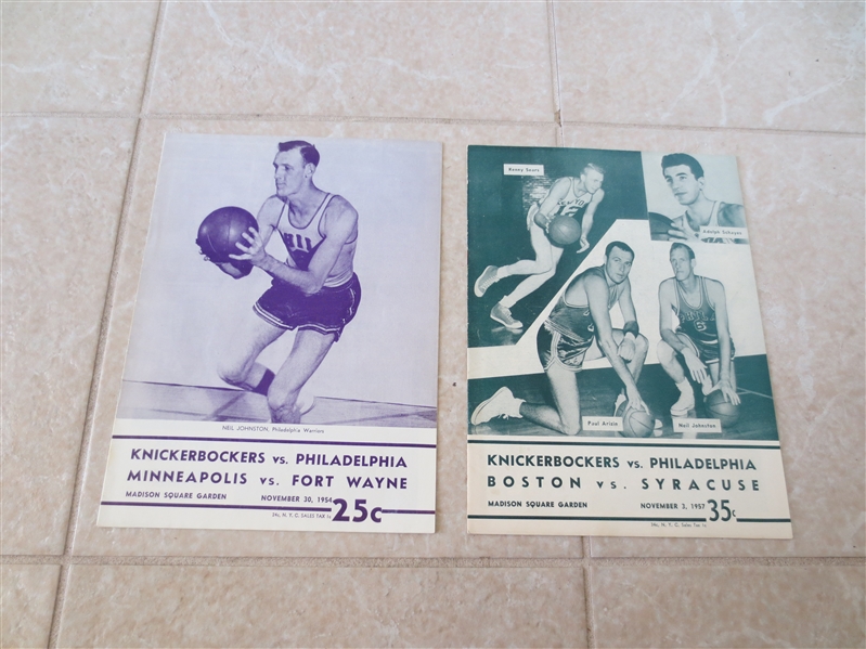 (2) 1954, 57 Unscored New York Knicks basketball programs both vs. Philadelphia Warriors
