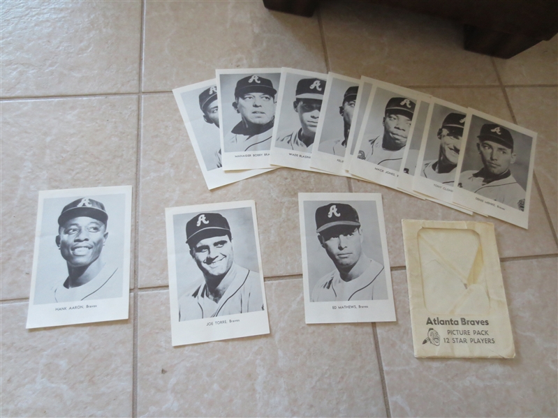 Baseball Odds and Ends Grab Bag: 60's Braves picture pack, vintage New York Yankees team photos, Ripken mini bat, wrappers, schedule, Sports Illustrated