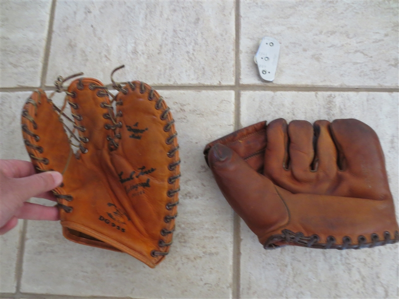 Carl Furillo and Frank Torre store model baseball gloves plus a Rawlings strike indicator
