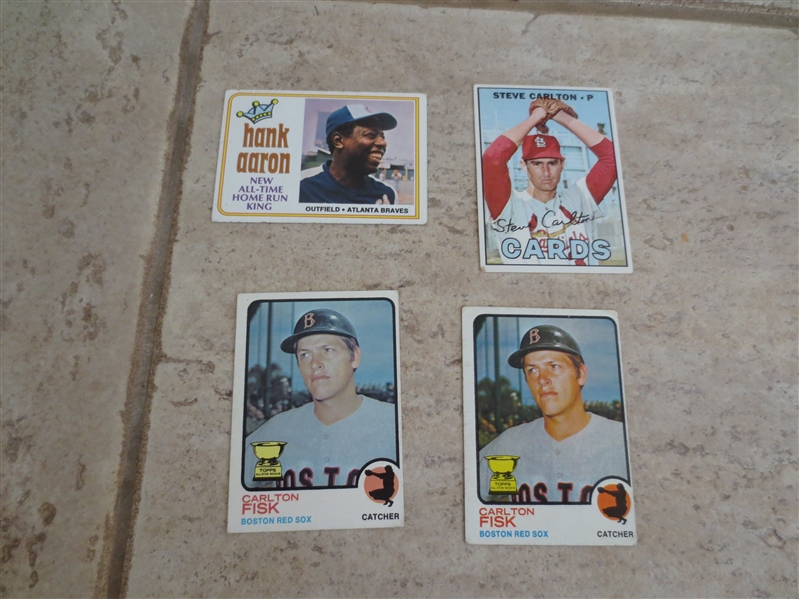 (4) Vintage Hall of Famer Topps baseball cards: Hank Aaron, Steve Carlton, (2) Carlton Fisk