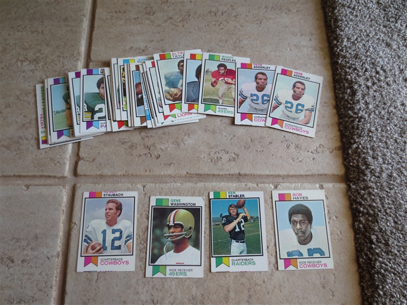 (35) 1973 Topps football cards including Staubach, Stabler rookie,  Hayes, Adderly, and more