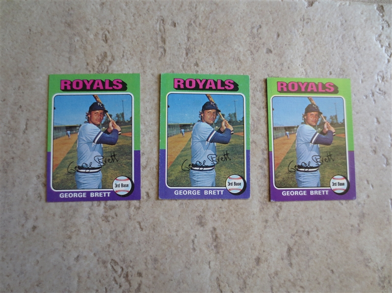 (3) 1975 George Brett rookie baseball cards in varying condition.  Hall of Famer!