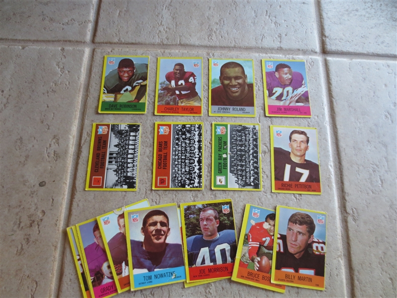 (17) 1967 Philadelphia football cards including Dave Robinson, Roland, Marshall, Charley Taylor, and team cards