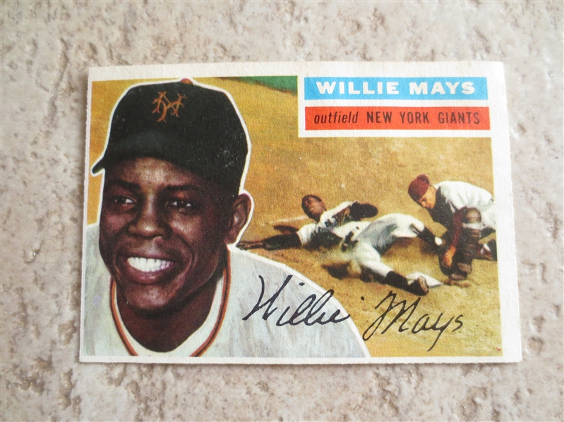1956 Topps Willie Mays baseball card with very nice front but back damage from scrapbook