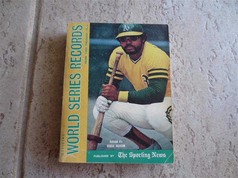 1973 Official World Series Records Guide book by the Sporting News with Reggie Jackson cover