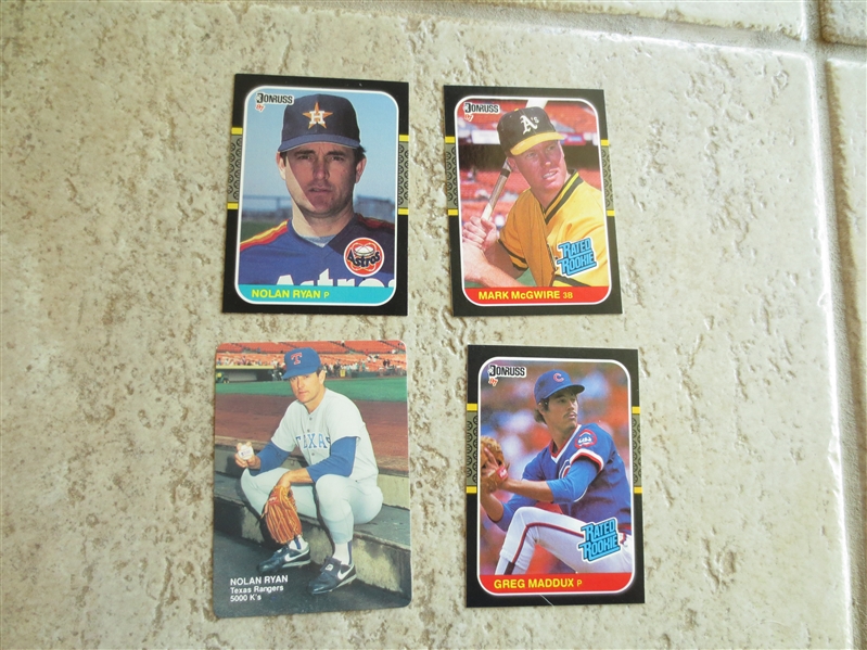 1987 Donruss baseball cards of Nolan Ryan, Mark McGwire, and Greg Maddux in beautiful condition PLUS Nolan Ryan Mothers Cookies card