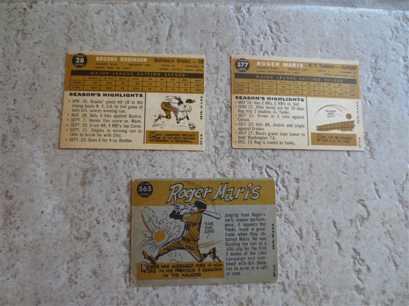 (3) 1960 Topps Superstar baseball cards:  Brooks Robinson, Roger Maris, Maris Sport Magazine
