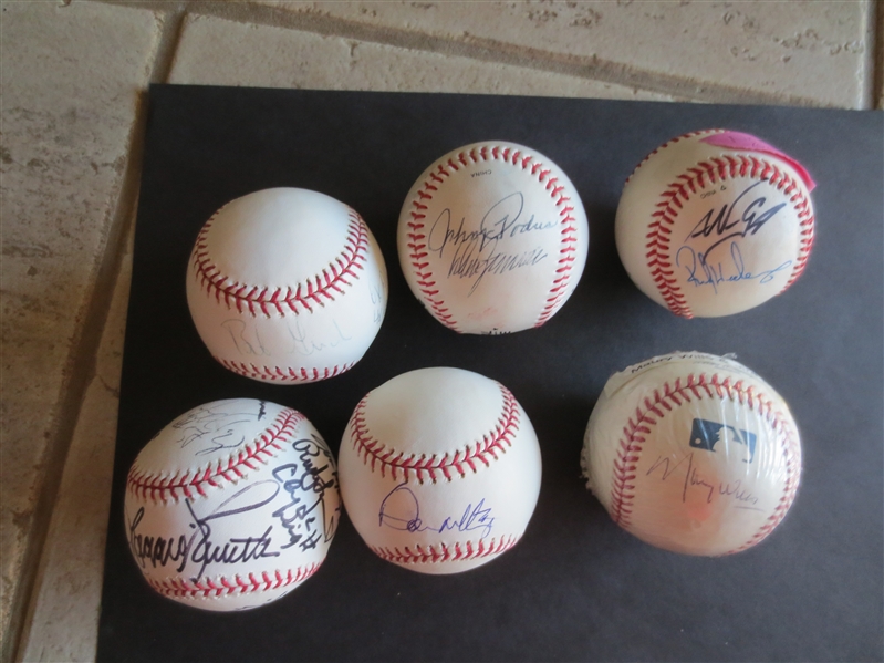 (6) Autographed Baseballs with numerous signatures of baseball and football players including Rickey Henderson and Nomar Garciaparra