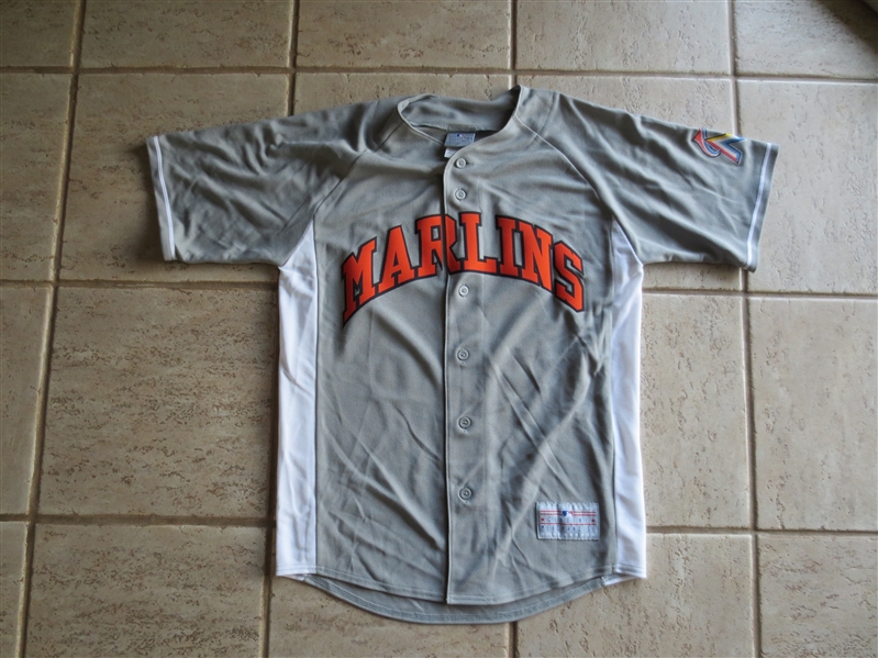 (2) Replica Unused Baseball Jerseys: Cincinnati Vest of Freel + Marlins Road of Mark Buehrle