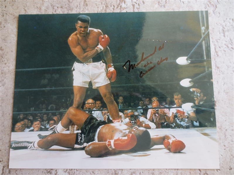 Autographed Mohammad Ali aka Cassius Clay 7.5  x 9.5 Color Photo  NO CERT.