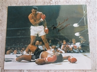 Autographed Mohammad Ali aka Cassius Clay 7.5 " x 9.5" Color Photo  NO CERT.