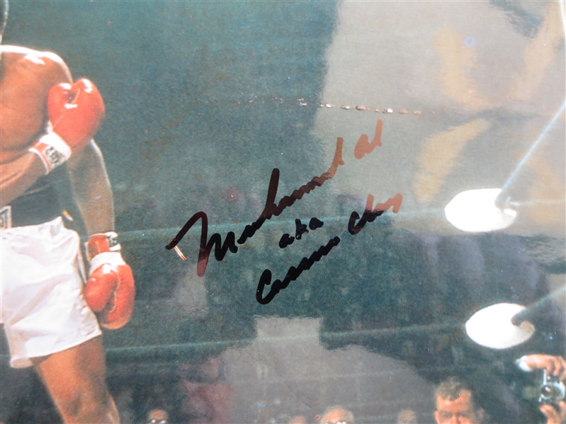 Autographed Mohammad Ali aka Cassius Clay 7.5  x 9.5 Color Photo  NO CERT.