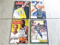 (4) different Sports Illustrated Magazines with Basketball Superstar Covers: Magic Johnson, Larry Bird, Jabbar, Shaq