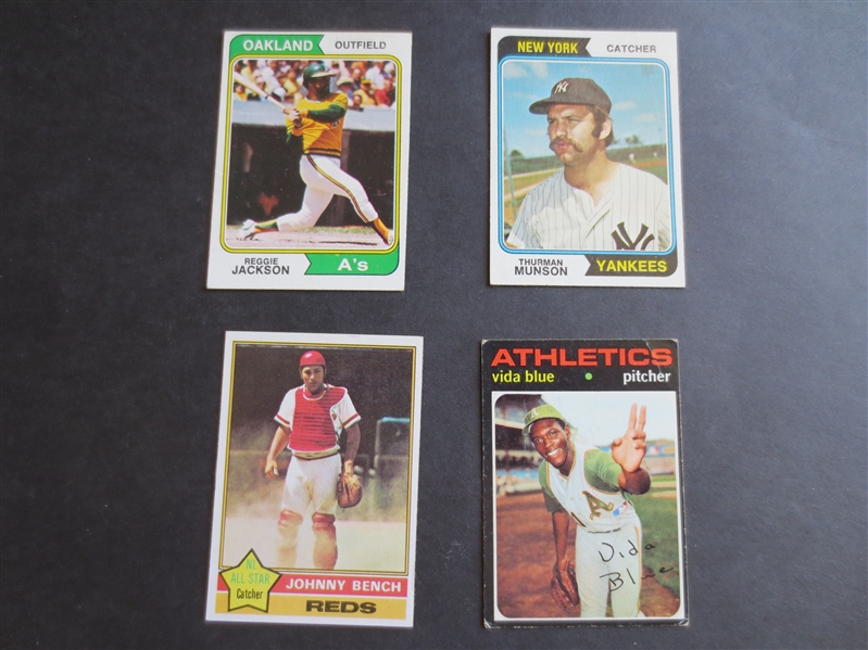(4) 1970's Topps baseball cards of Reggie Jackson, Thurman Munson, Johnny Bench and Vida Blue