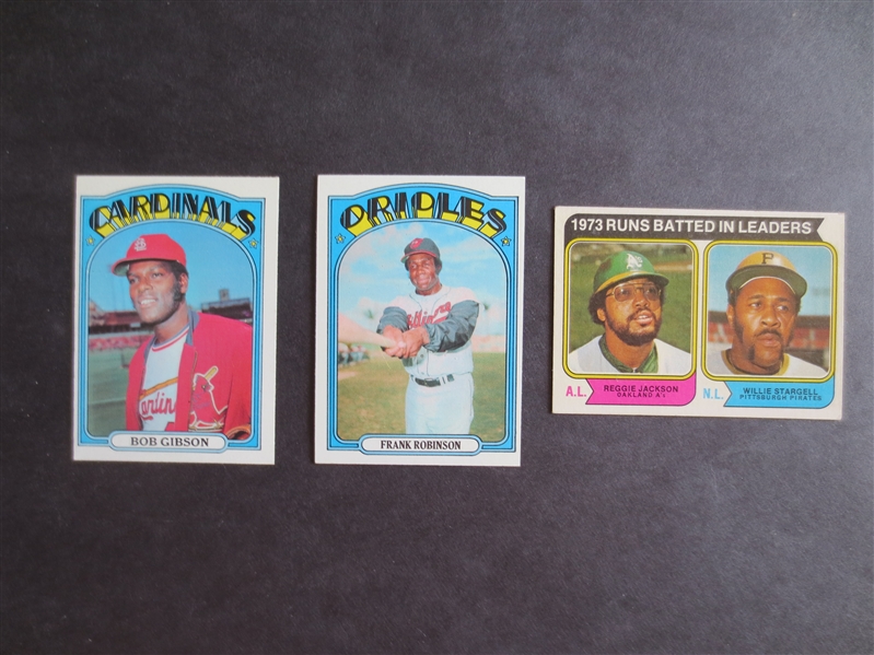 1972 Topps Bob Gibson and Frank Robinson baseball cards plus a 1974 Topps RBI Leader card of Reggie Jackson and Willie Stargell